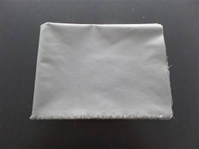 Tissu de coton avec salissure noir de carbone/huile d'olive - 1 mètre